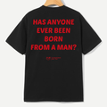 A black short-sleeve t-shirt hanging on a wooden hanger, showing the back with bold red text that reads 'HAS ANYONE EVER BEEN BORN FROM A MAN?'. A small red 'YLD' logo is printed below the text.