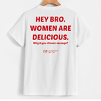 White short-sleeve T-shirt hanging on a wooden hanger against a light gray background, featuring large red text on the back that reads 'HEY BRO. WOMEN ARE DELICIOUS.