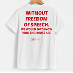 White short-sleeve T-shirt hanging on a wooden hanger against a light gray background, showing the back with large red text reading 'WITHOUT FREEDOM OF SPEECH. WE WOULD NOT KNOW WHO THE IDIOTS ARE' and a small red YUR logo near the lower back.